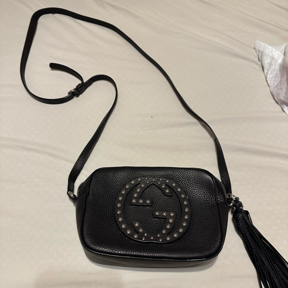 Authentic Gucci crossbody purse with tassel - black - barely used